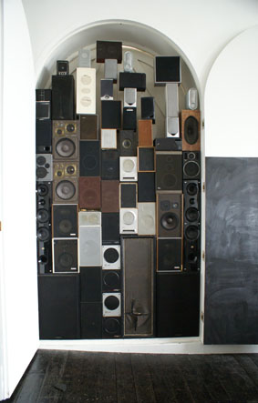 Doorway filled with speakers